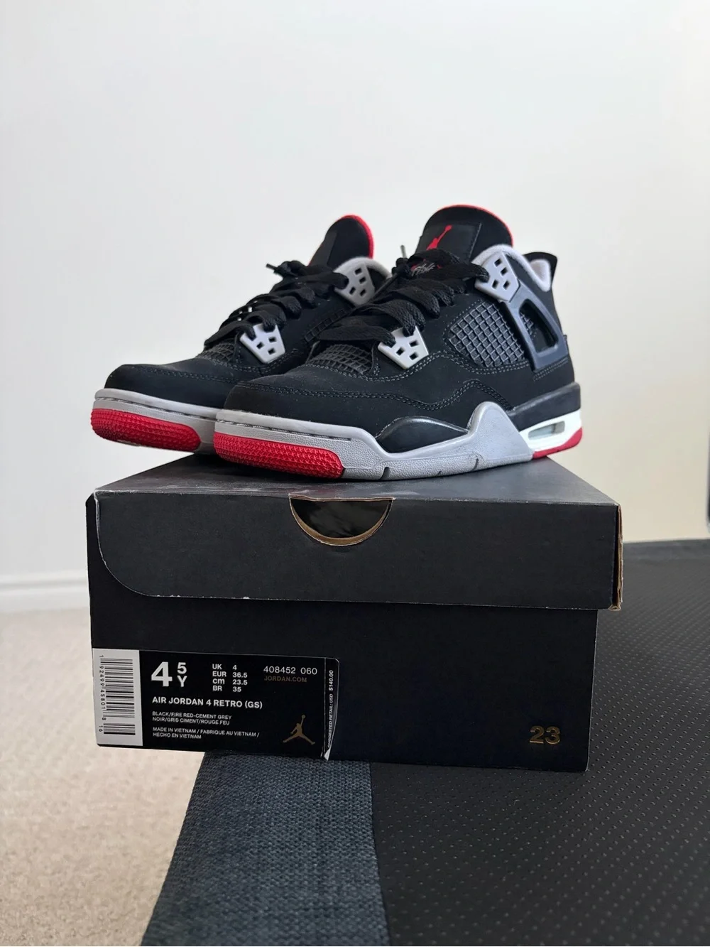 Air Jordan Retro Black/Red “Bred” 4 Size 4.5Y